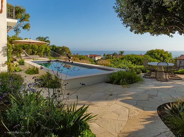 Raised Smooth Stucco Pool with Stone Coping Cap
