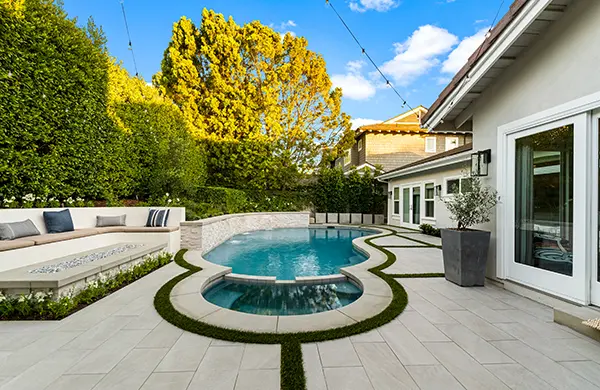 New Swimming Pool with Stone Backdrop Wall
