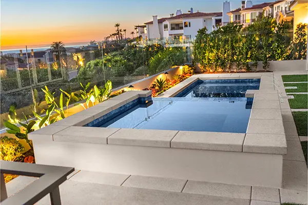 Raised Spa with Smooth Concrete Finish & Poured In Place Coping